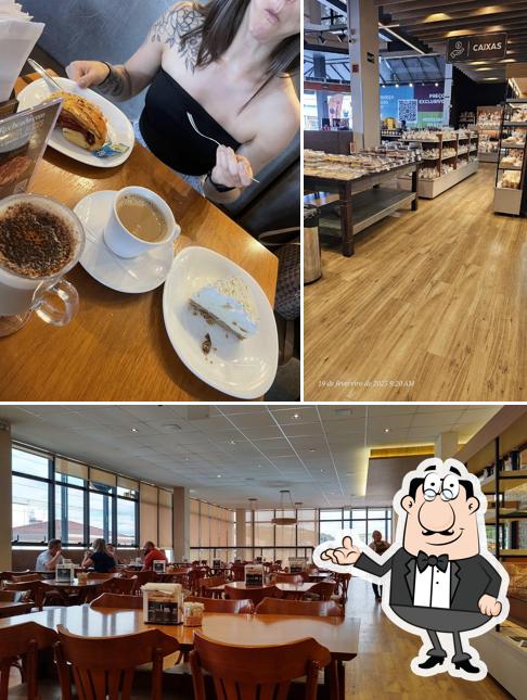 Sente em uma das mesas no Artezan Mega Padaria