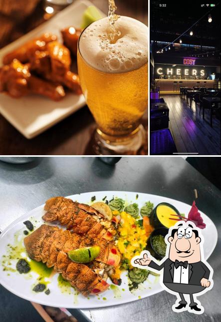 The picture of interior and beverage at Cosy Resto Pub