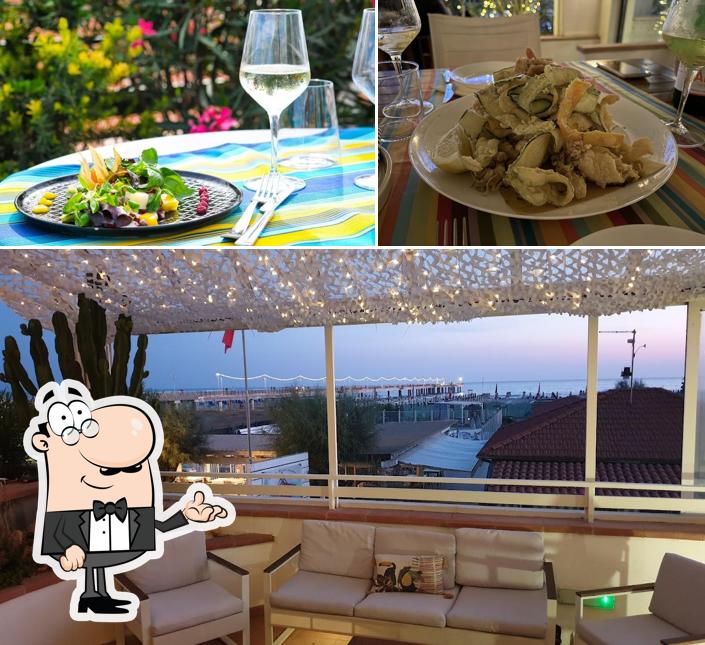 Guarda la immagine che presenta la interni e cibo di Terrazza Versilia