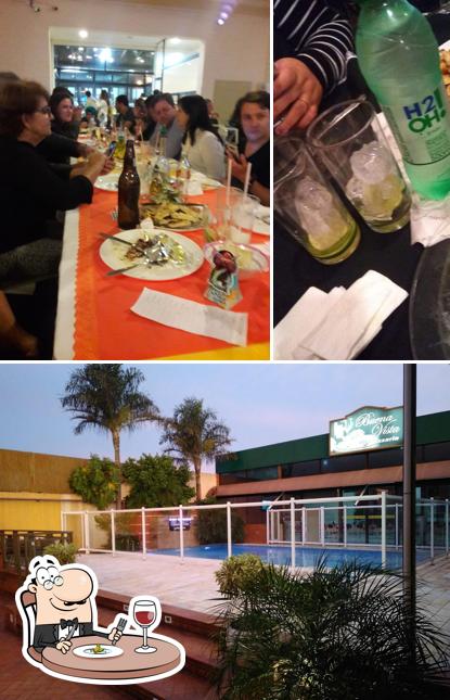 Entre diferentes coisas, comida e exterior podem ser encontrados no Pizzaria Buena Vista São Carlos - Rodízio de Pizzas + Massa Show + Mesa de Saladas