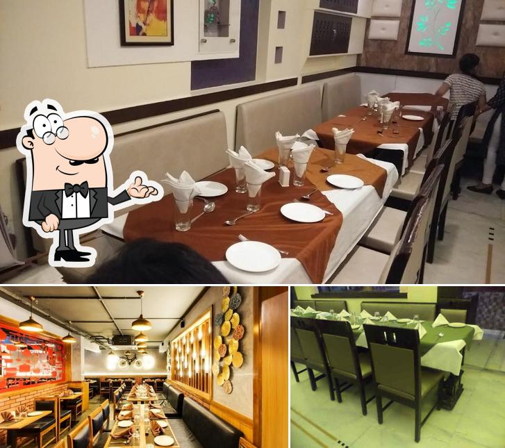 Take a seat at one of the tables at Shree Mehfil