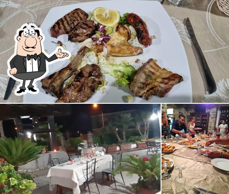 Questa è la immagine che raffigura la interni e cibo di A Cucina i Donna Rosina