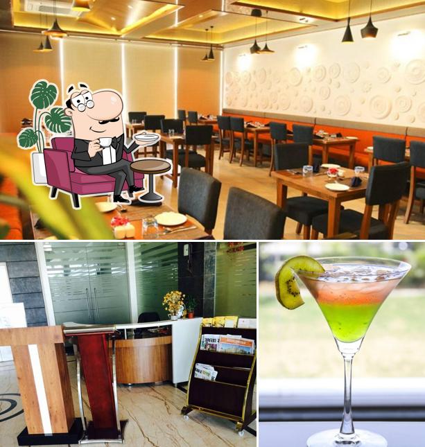 Check out the image depicting interior and alcohol at Raj Tadka