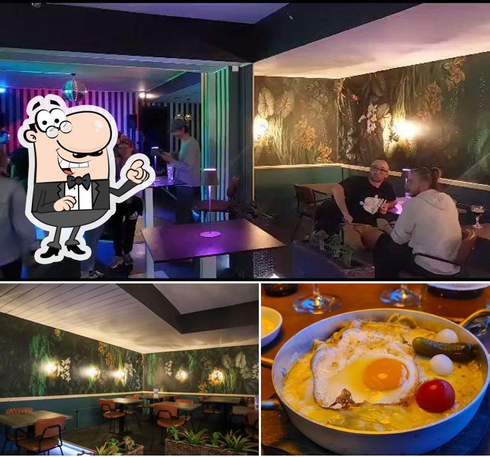 Questa è la immagine che mostra la interni e cibo di Le 13 Lounge-Bar