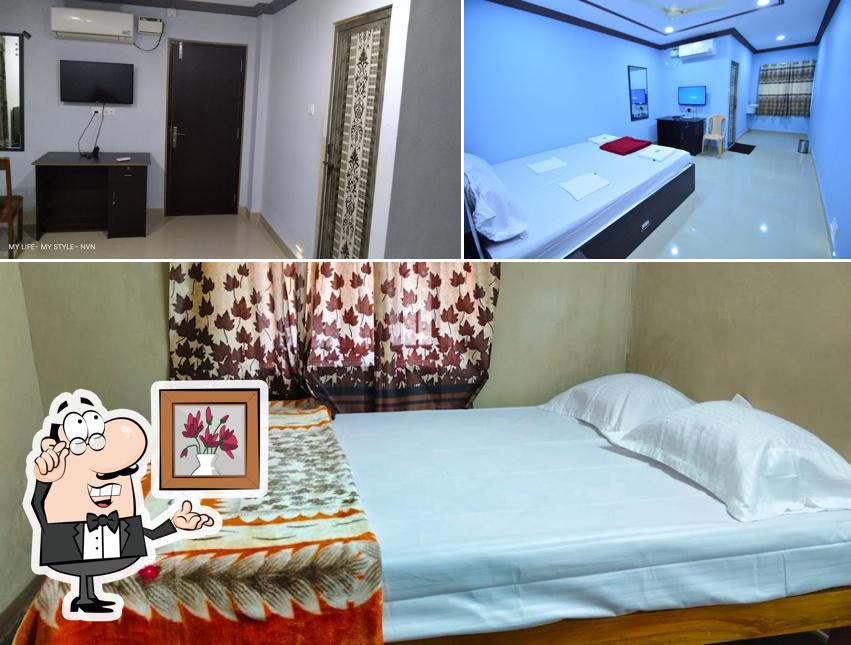 Take a seat at one of the tables at Hotel Keerthi