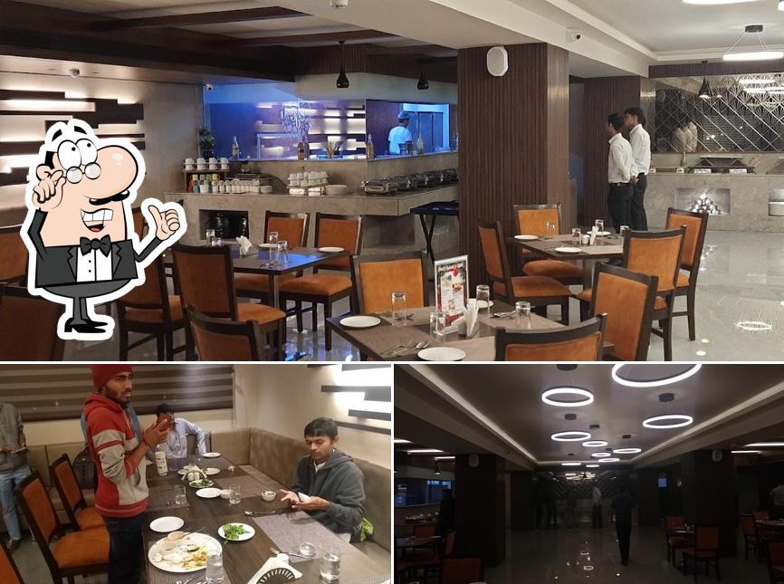 Take a seat at one of the tables at 5868 Restaurant