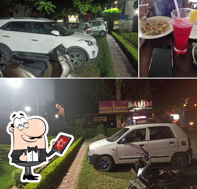 The photo of exterior and beverage at Atithi restaurant