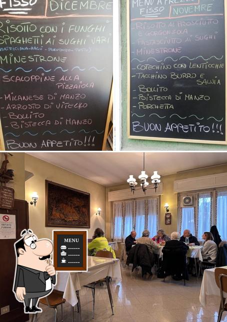 La immagine di lavagna e interni da Bar Trattoria l'Aida