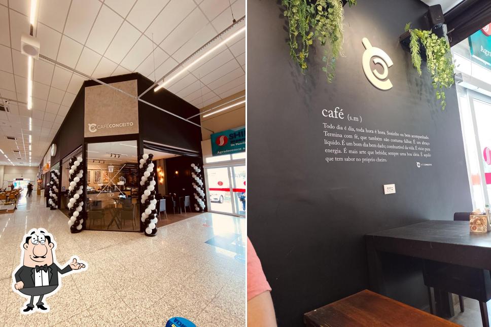 Sente em uma das mesas no Café Conceito Bonfim