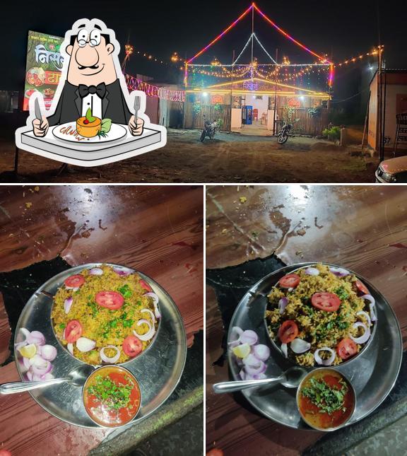 The image of food and exterior at New Nisarg Family Restaurant