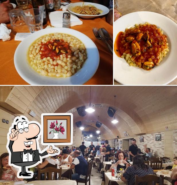 Dai un'occhiata agli interni di Trattoria L'Orologio