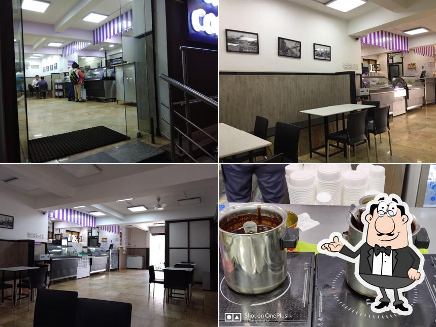 Take a seat at one of the tables at Corner House - Kasturi Nagar