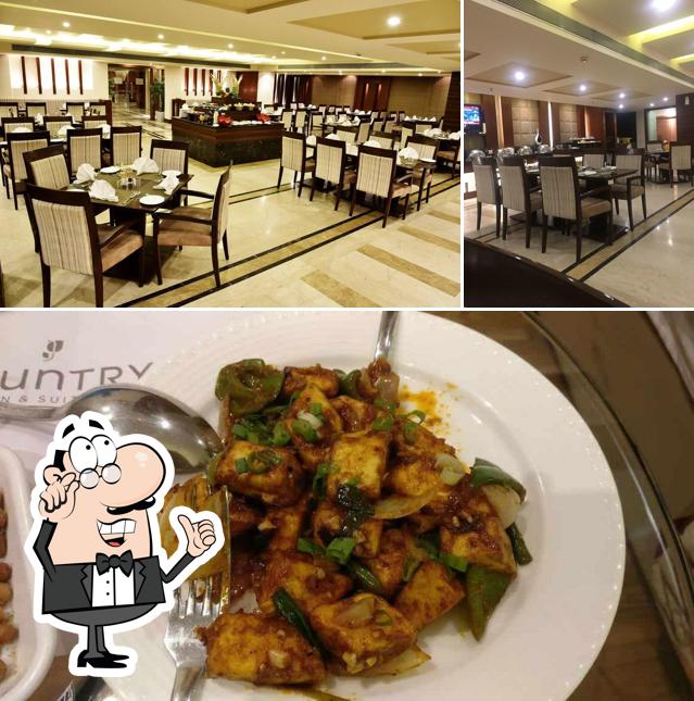 The photo of Mosaic - Country Inn & Suites By Radisson’s interior and food
