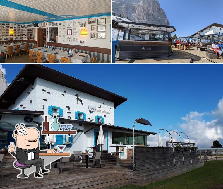 Questa è la foto che mostra la interni e esterno di Rifugio Emilio Comici