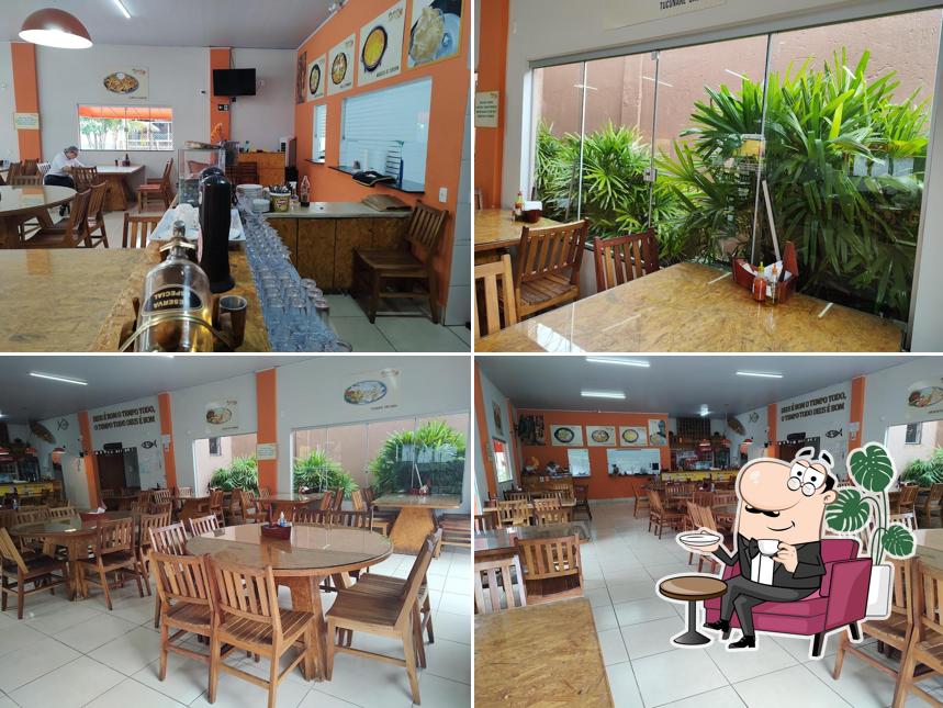 O interior do Restaurante Ilha do Peixe