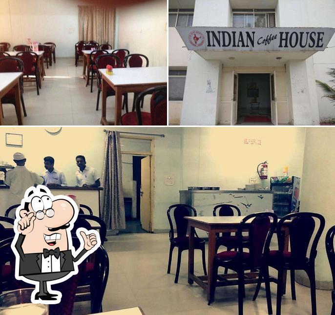 Take a seat at one of the tables at Indian Coffee House