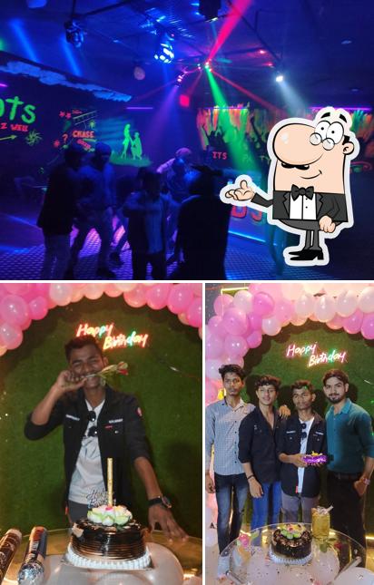 Take a look at the picture showing interior and food at 3 IDIOTS CAFE CLUB & LOUNGE