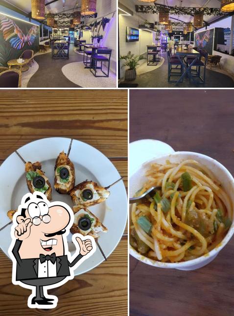 This is the photo depicting interior and food at JAMUN CAFE INDORE