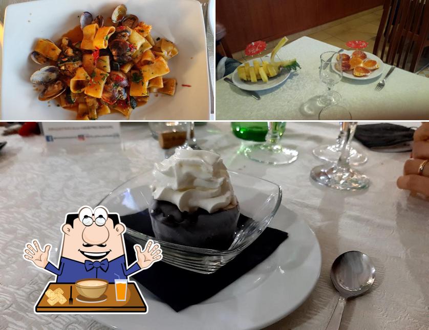 Tra le diverse cose da Hotel Ristorante Pizzeria San Giorgio si possono trovare la cibo e tavolo da pranzo