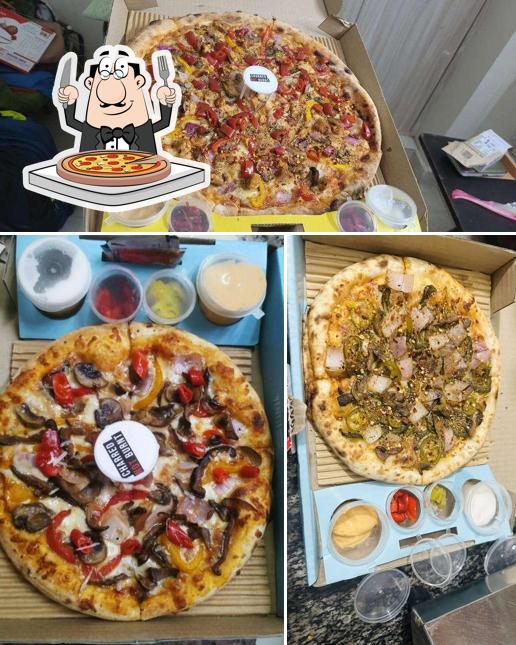 Get pizza at Slyce Pizza