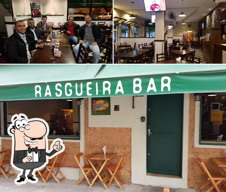 Take a seat at one of the tables at Rasgueira