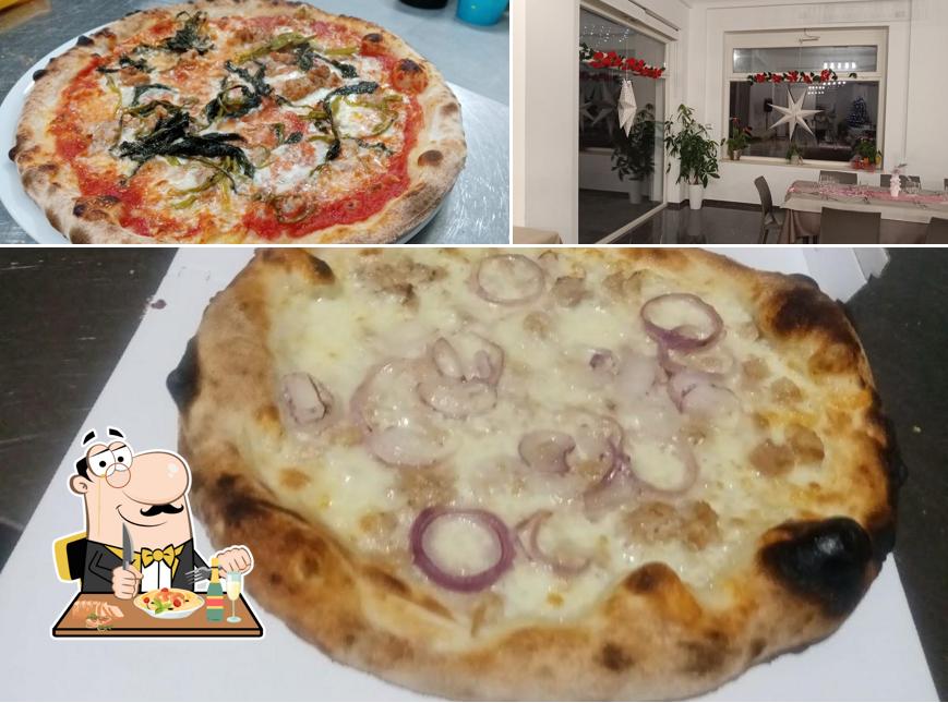 Dai un’occhiata alla immagine che presenta la cibo e interni di Ai Laghetti