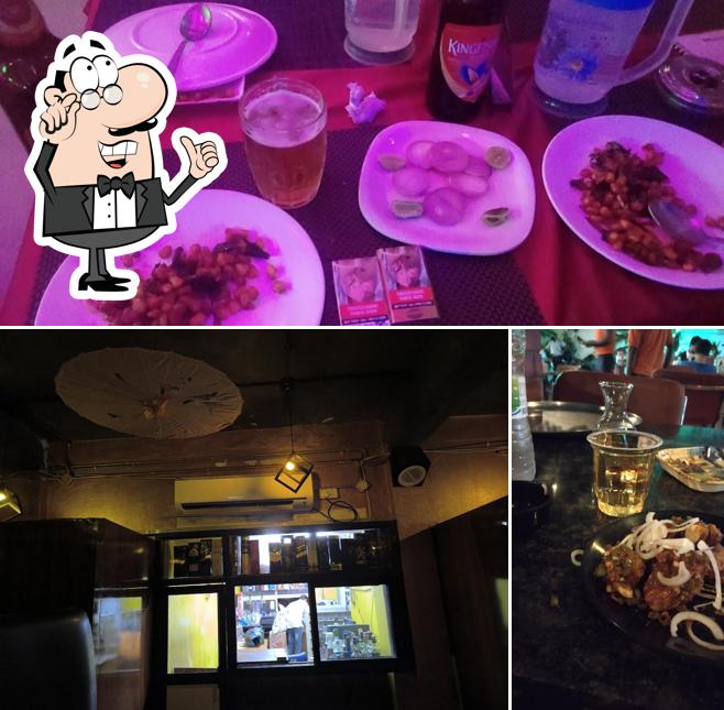Take a seat at one of the tables at Bar Station