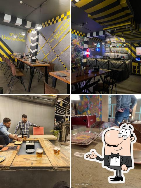 Take a seat at one of the tables at Traffic Jam Restaurant and Cafe-Bar