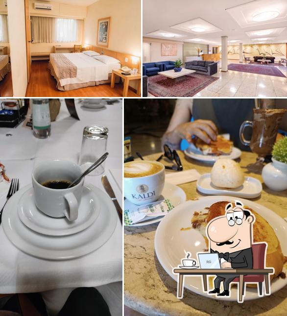 Esta é a ilustração apresentando interior e comida no Café Royal Hotel Crystal