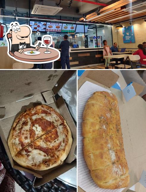 Take a look at the photo depicting food and interior at Domino's Pizza Tilhari, Bhatauli