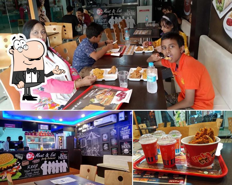 Check out the picture depicting interior and beer at Meat & Eat