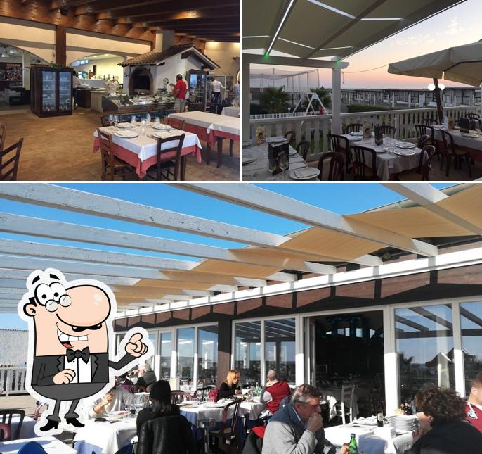 Siediti a un tavolo di Ristorante La Bussola Ostia