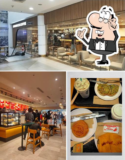 The interior of Starbucks Coffee Vastrapur