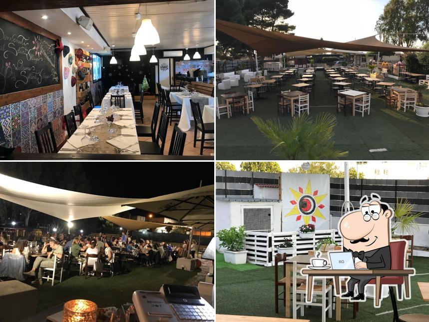 Siediti a un tavolo di Solart Village Ristorante Pizzeria