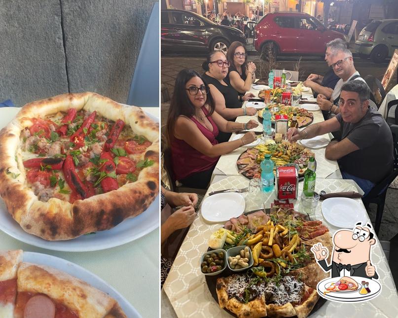 A Pizzeria Avanti un'Altro!, puoi prenderti una bella pizza