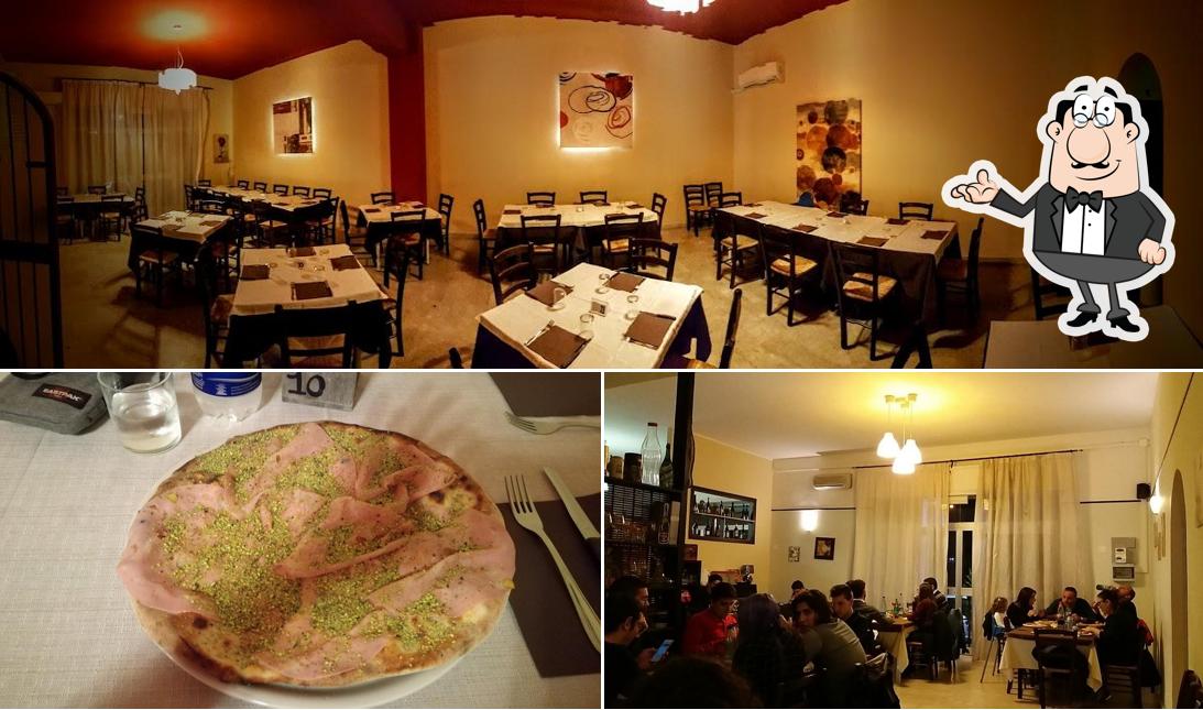 Pizzeria Quattro Quarti si caratterizza per la interni e cibo