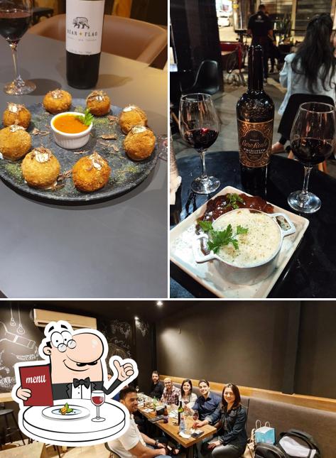 A ilustração do La Vinicola Wine Bar - Lourdes’s comida e quadro-negro