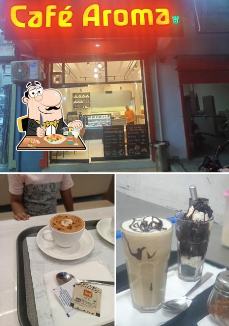 Among different things one can find food and interior at Cafe Aroma Veg Bhiwadi