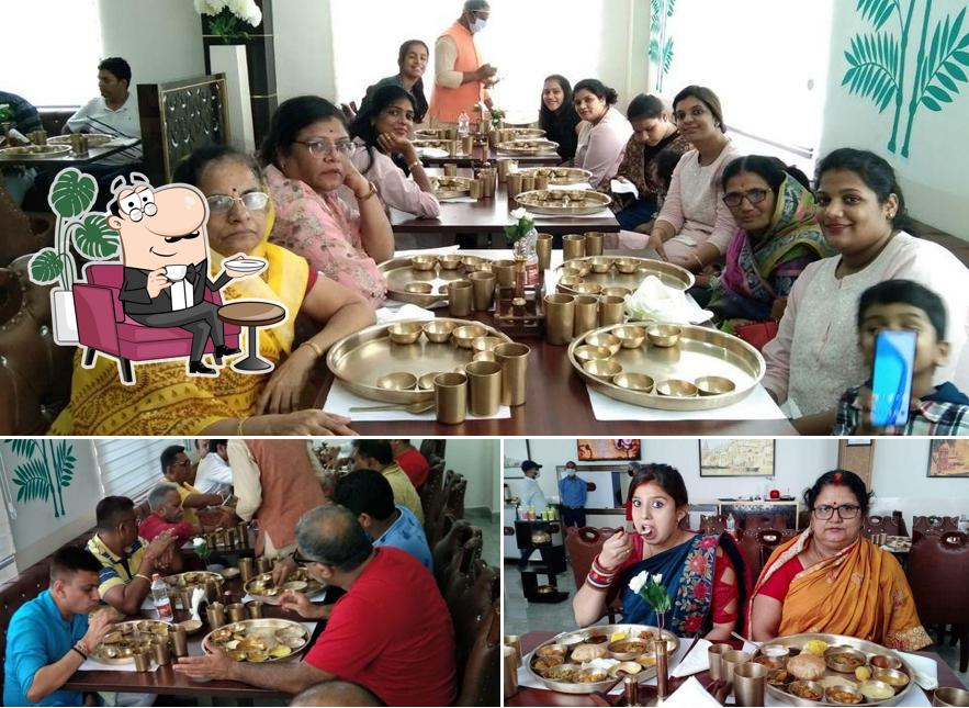 Take a seat at one of the tables at Shree Shivay Thali Dining Varanasi