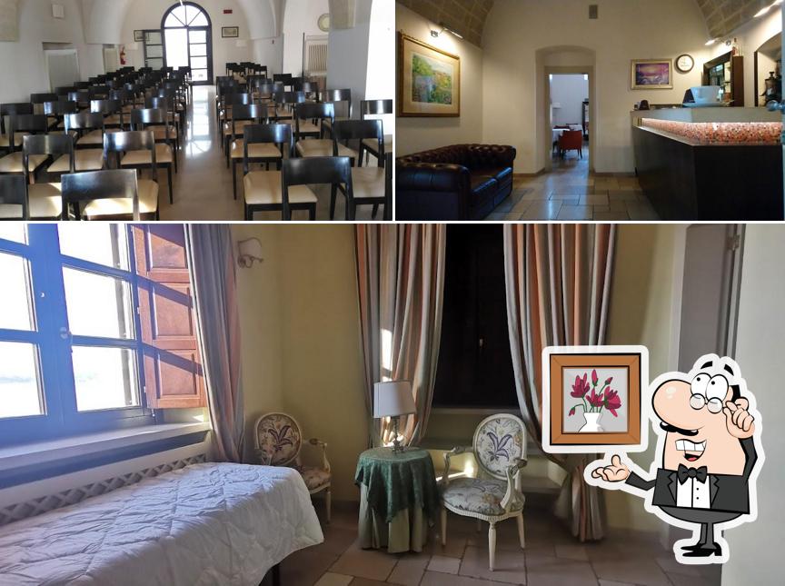 Siediti a un tavolo di Al Faro Hotel Ristorante Masseria Saraceno
