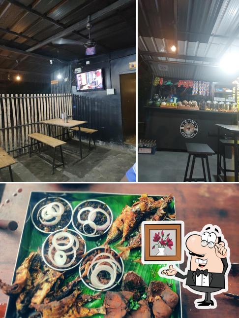 Among various things one can find interior and food at Al-BAB Restocafe