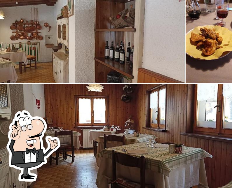 Questa è la foto che presenta la interni e bevanda di Ristorante Pizzeria Il Pinguino