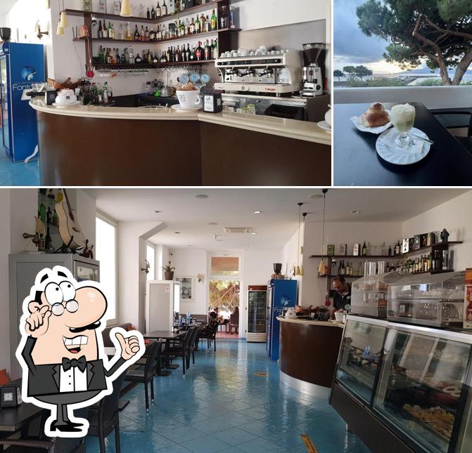 Guarda la foto che presenta la interni e esterno di cocktail bar LaVela