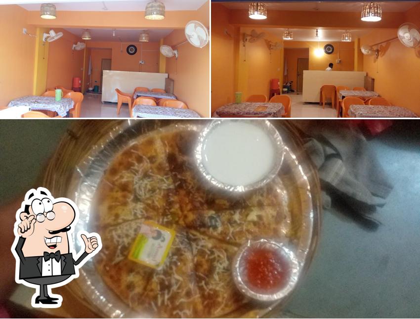 Among various things one can find interior and seo_images_cat_42 at Rajwadi Paratha House