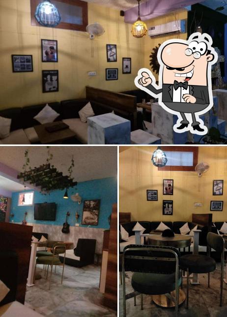 Take a seat at one of the tables at Blueberrys Cafe