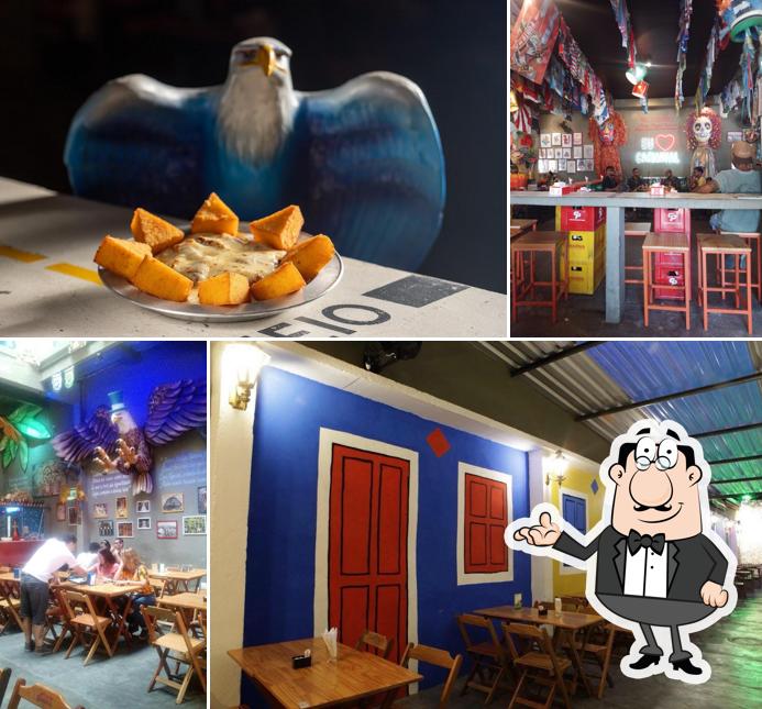 Sente em uma das mesas no Baródromo