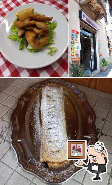 Dai un'occhiata agli interni di Trattoria Al 106