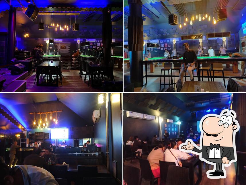 Take a seat at one of the tables at XL Restaurant