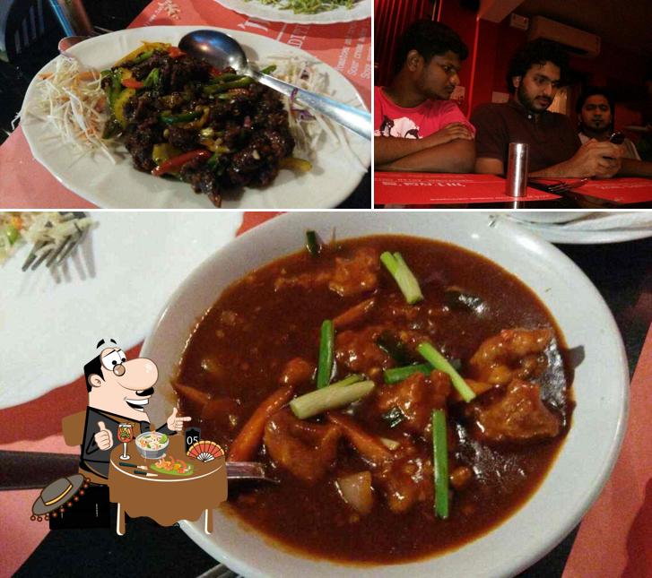 Check out the image displaying food and bar counter at Ming's Wok chinese restaurant