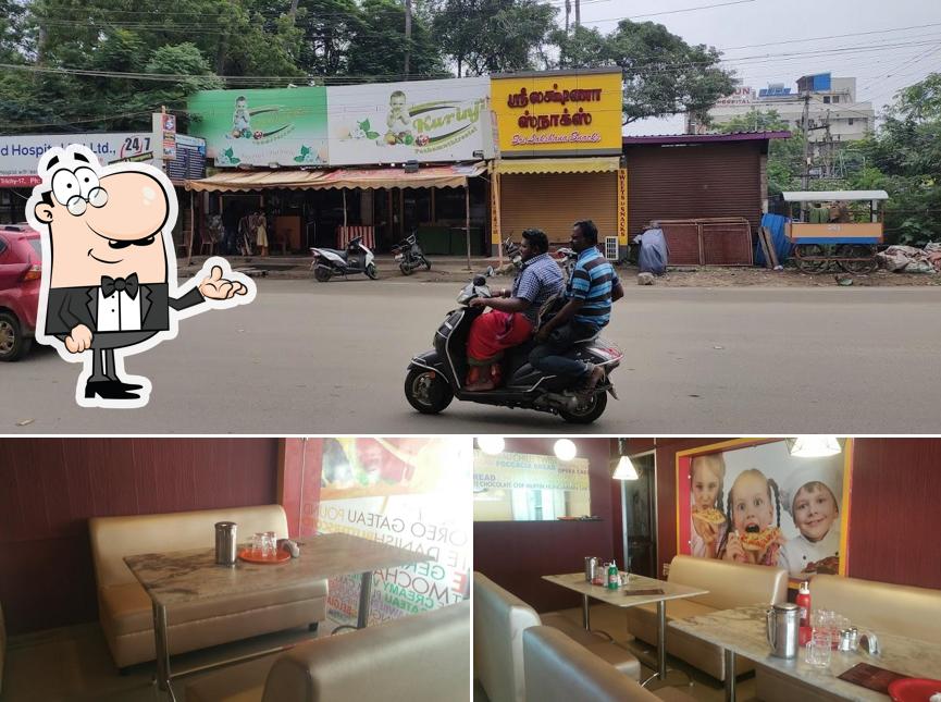 This is the photo depicting interior and food at Kurinji Pizza House